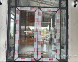 Thi công cửa nhôm Xingfa hệ 100 tại Thủ Đức: khung bản lớn, kính hộp nan đồng